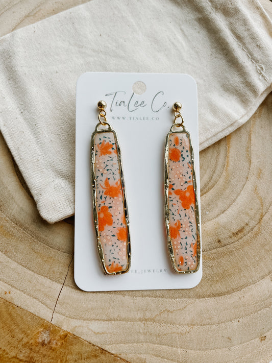 TIALEE: Pink/Coral Long Gold Earrings